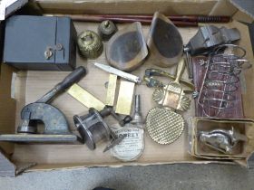 A small vice, brass bells, pencil sharpener, plated toast rack, desk stamp, etc.