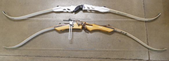 Two archery bows, Merlin Take-Down and Ragim Wildcat, one left and one right handed