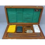 A 12-bore shot gun cleaning kit, cased