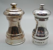 A silver pepper grinder and an electro plate grinder