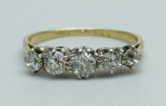 An 18ct gold, five stone diamond ring, approximately 0.70 diamond weight, 2.2g, P, with vintage box