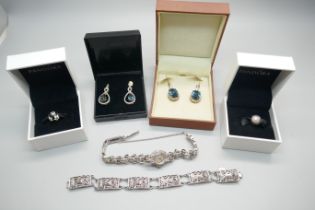Two pairs of silver gilt earrings, two Pandora charms with boxes, a bracelet and a lady's wristwatch