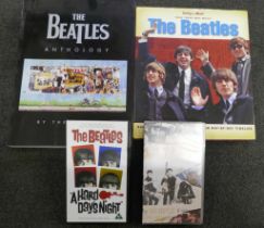 Two books on The Beatles, including The Beatles Anthology and two VHS video tapes, The Beatles, Hard