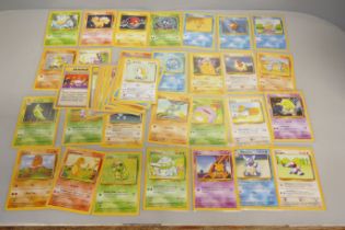 50 Base Set vintage Pokemon cards, common/uncommon and rare