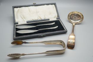 A pair of William IV Scottish silver sugar bows, Glasgow 1836, Daniel Robertson, a pair of silver