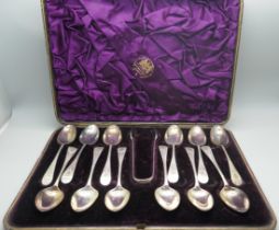 A cased set of twelve spoons and sugar bows