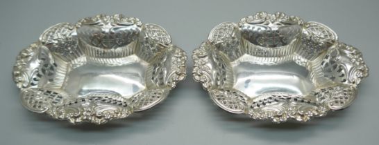 A pair of Victorian silver pierced and embossed dishes, Birmingham 1897, 53g