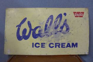 Two metal Wall's Ice Cream advertising signs