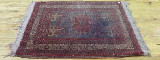 An Afghan prayer mat, 91cm x 150cm