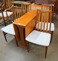 A G-Plan Fresco teak drop-leaf table and four chairs