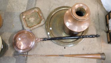 A collection of copper and brassware