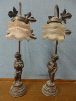 A pair of figural table lamps