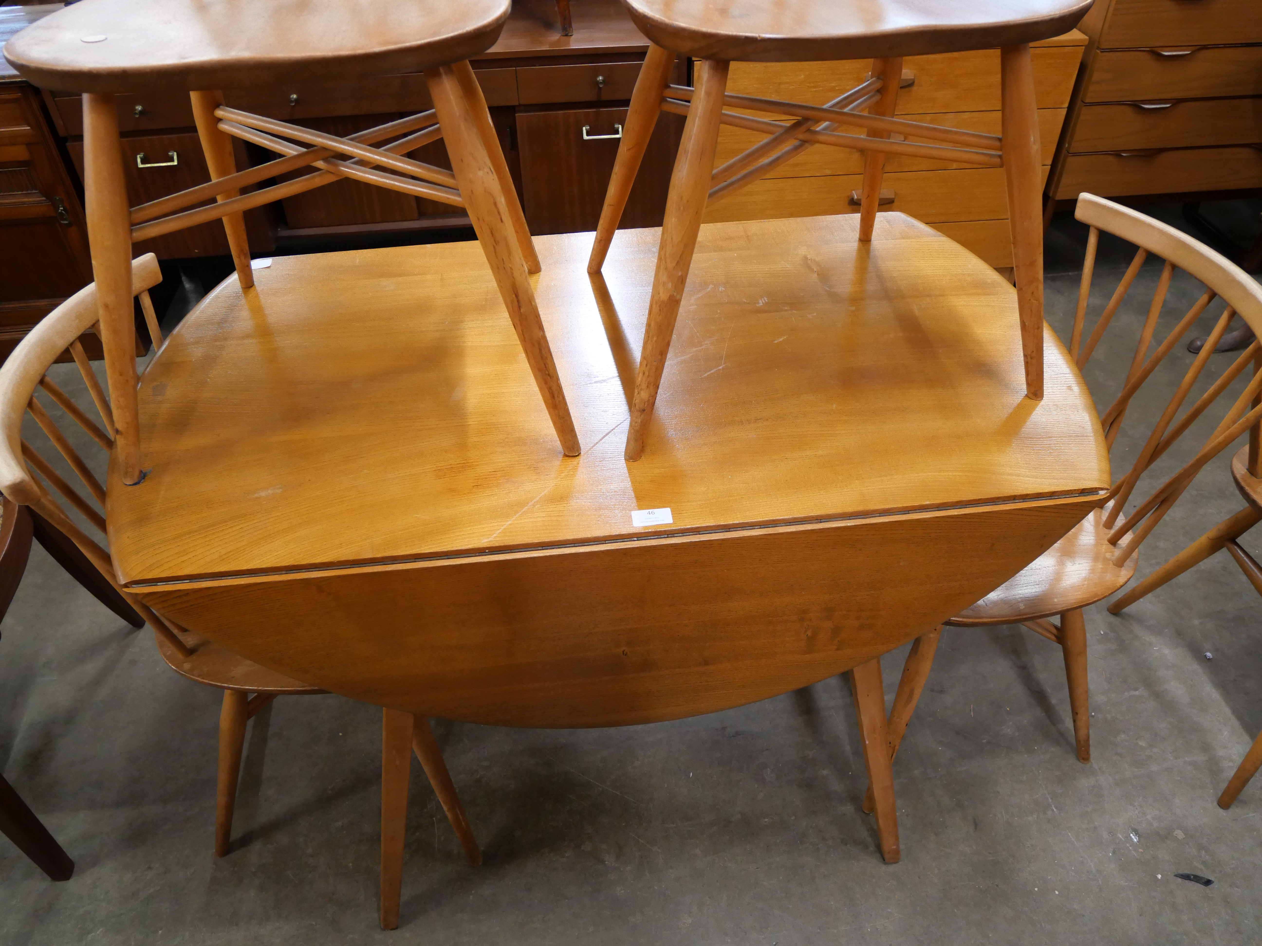 An Ercol Blonde elm and beech Windsor drop leaf table and four candlestick back chairs - Image 2 of 3