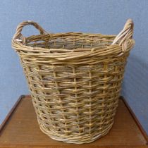 A large wicker laundry basket