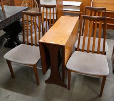 A G-Plan Fresco teak drop-leaf table and four chairs