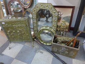 A brass fire screen, fire set, witch's eye mirror, an embossed mirror with two brushes, bed