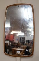 A teak framed mirror