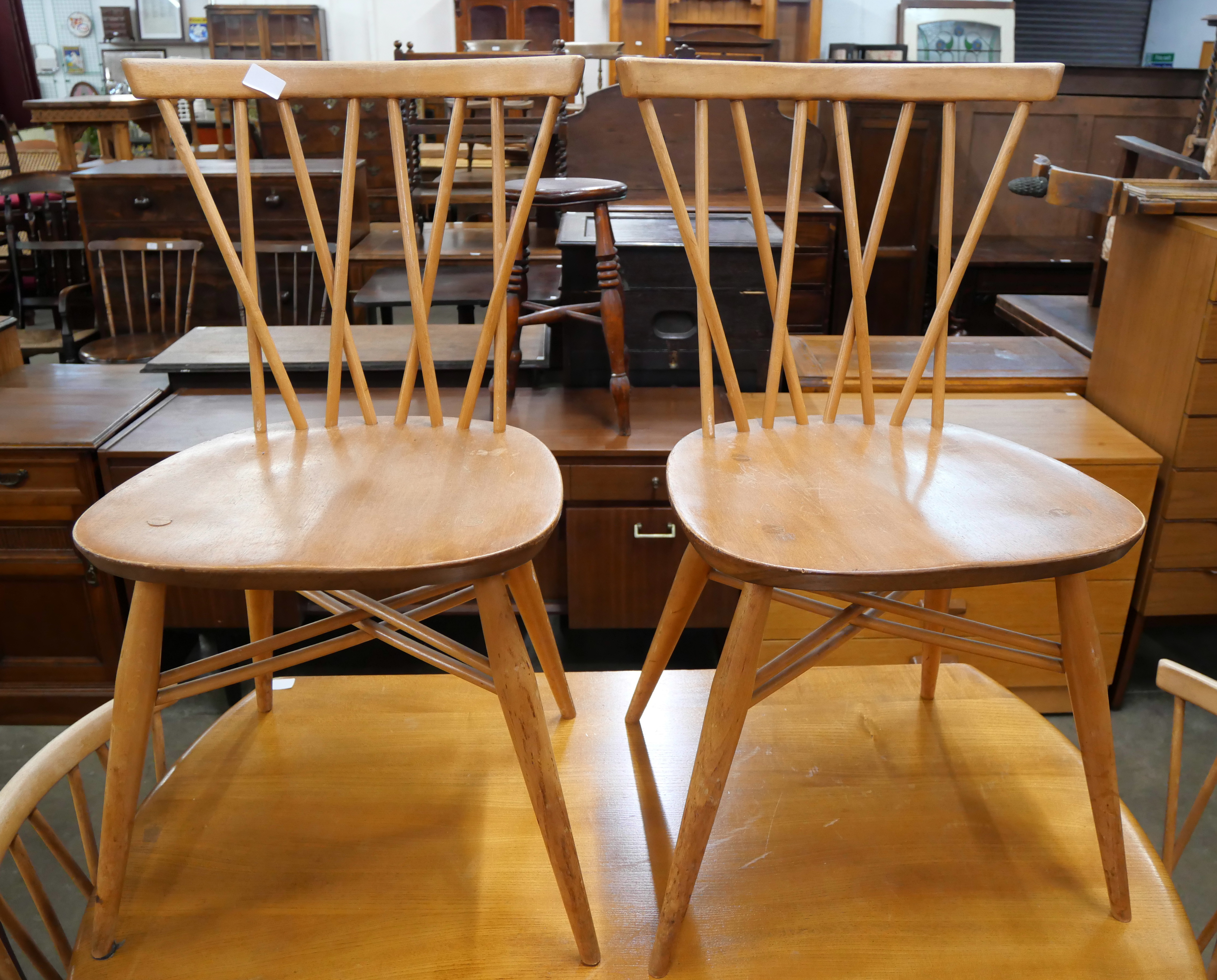 An Ercol Blonde elm and beech Windsor drop leaf table and four candlestick back chairs - Image 3 of 3