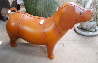 A Liberty style tan leather dog footstool
