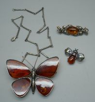 A large silver and amber butterfly brooch, marked DPA and with Birmingham import mark, with attached