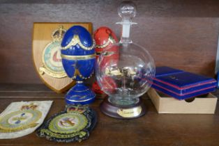 Two Bradford Exchange RAF themed eggs with model aircraft, a RAF Squadron 10 plaque, test pilot