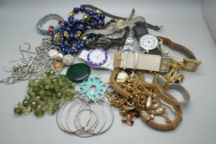 A collection of costume jewellery and watches including a vintage Ancre ladies watch and a silver