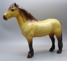 A Beswick Highland pony