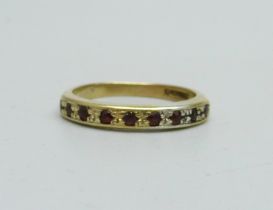 A silver gilt half-eternity ring, M