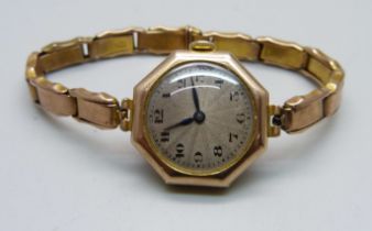 A lady's 9ct gold Swiss made Vertex wristwatch, 236091, on a 9ct gold bracelet strap, total weight