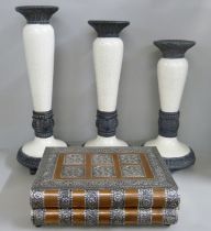 Three graduated candle stands and a Moroccan inspired jewellery case