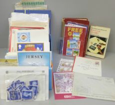 Stamps; a box of stamp albums, covers, presentation packs, etc.