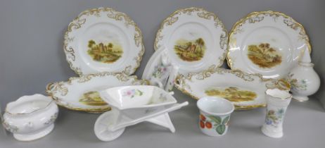 A four setting dessert service and two bread and butter serving plates, each decorated with
