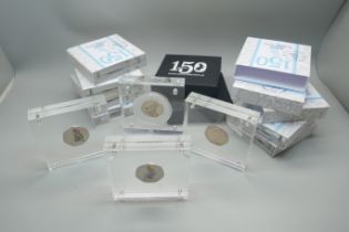 Eleven cased Royal Mint Beatrix Potter 150 years 50p coins; presented in Perspex blocks .