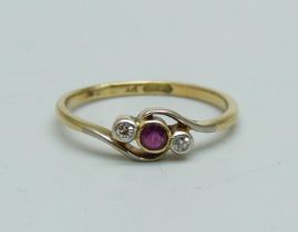 An 18ct gold, ruby and diamond three stone ring, 1.5g, K/L