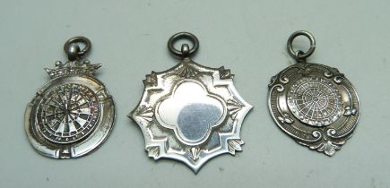 Three silver fob medals including two darts, 18g
