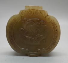A carved jade scent bottle, lacking stopper