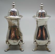 A pair of silver peppers, Birmingham 1899, 69g