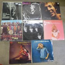 Eight LP records, 1960s artists including The Rolling Stones, The Beatles, Scott Walker, Nancy