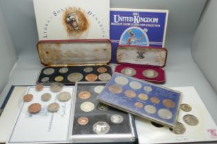 Eight UK mint coin sets, EIIR 1965 set, 1986 set, 1984 set, etc.