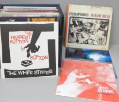 Thirty-five Indie 45rpm 7" records including White Stripes, Paul Weller, etc.