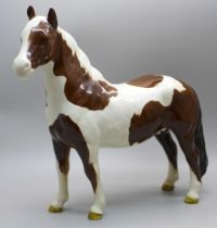 A Beswick Pinto Piebald pony, brown and white