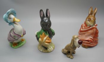 Three Beswick figures, Little Black Rabbit, Jemima Puddleduck and Poorly Peter Rabbit and a Wade