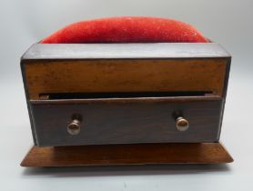 A circa 1900 birds eye maple and rosewood sewing tidy/pin cushion, 18.5cm wide at the base