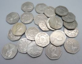 Twenty-four 50p pieces, 1973