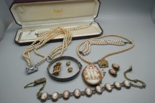 A 9ct gold cameo brooch, 14.5g, a silver bangle, faux pearls, etc.