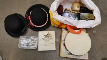 Assorted items including hats, thimbles, duck figures, DVDs, etc. **PLEASE NOTE THIS LOT IS NOT