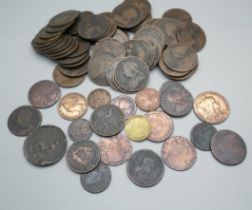 A collection of 1 penny coins, other coins and tokens