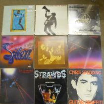 Nine rock LP records; Steely Dan, Bad Company, Buffalo Springfield, Bryan Adams