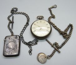 A silver fusee pocket watch with diamond end stone, a silver vesta case on a silver chain and a