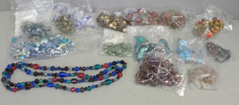 A quantity of vintage glass necklaces